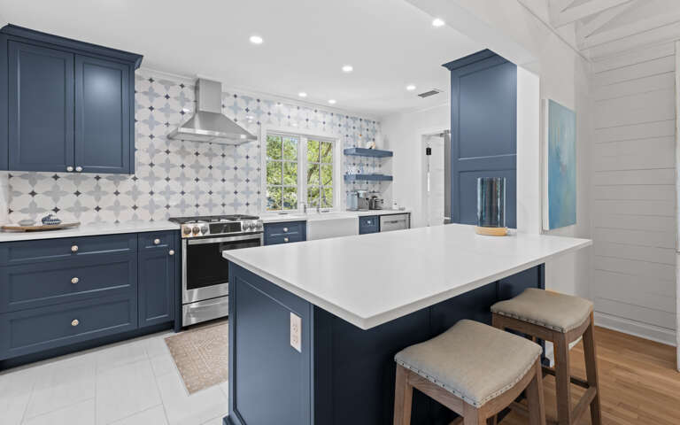 Interior Kitchen With Island And Blue Cabinets