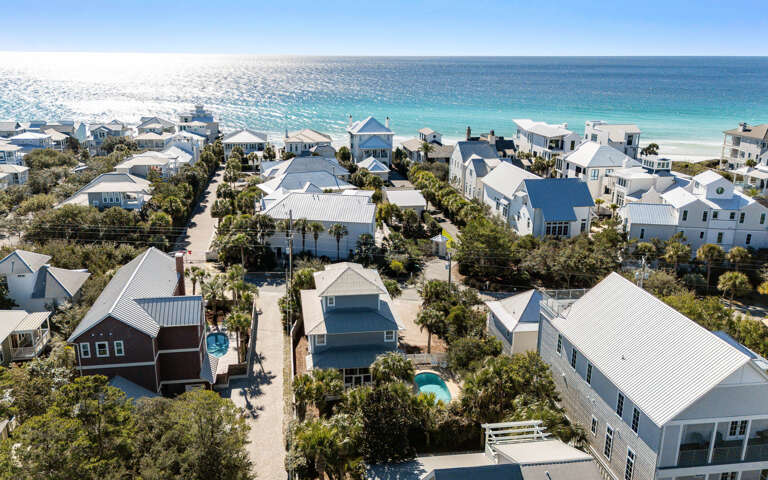 Charming coastal community with private pools just steps from pristine turquoise waters and white sand beaches.