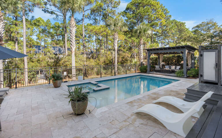 Poolside Patio, Pines, And Planters