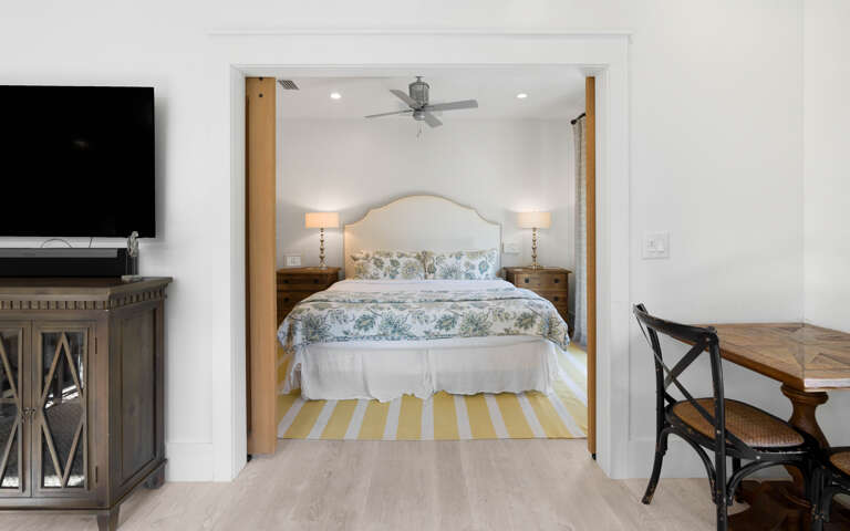 Step into your serene bedroom sanctuary, where soft botanical linens and warm bedside lighting create the perfect retreat for peaceful nights.