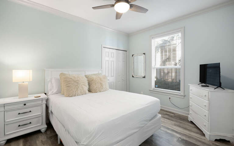 Relax in your peaceful bedroom with soft linens, gentle lighting, and modern touches to help you unwind after exploring.