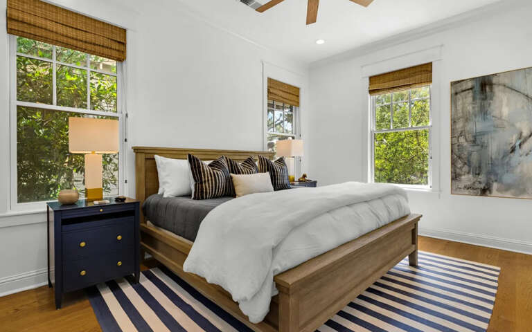 Drift off to peaceful sleep in this bright bedroom with garden views and thoughtful touches.