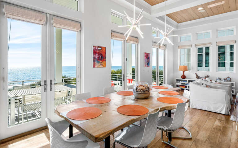 Dine in coastal elegance with stunning ocean views through floor-to-ceiling windows, where every meal becomes a memorable experience.