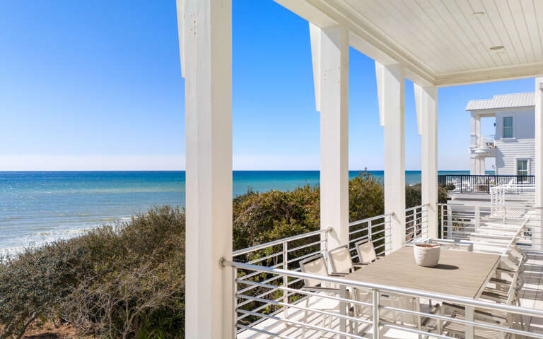 Your private balcony frames stunning ocean views where turquoise waters meet endless blue skies, creating the perfect spot for morning coffee or sunset relaxation.