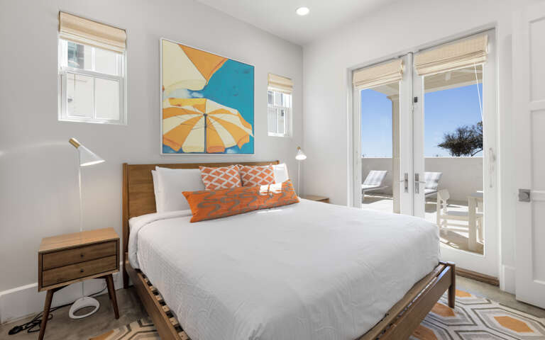 Wake up in your cheerful bedroom with crisp linens and step onto your private balcony to greet the day.