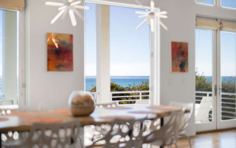 Watch the ocean sparkle from your dining table, where morning coffee and evening meals become unforgettable moments with endless blue views.