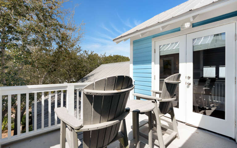 Step onto your private balcony where coastal breezes meet comfortable Adirondack chairsâperfect for morning coffee or evening relaxation.