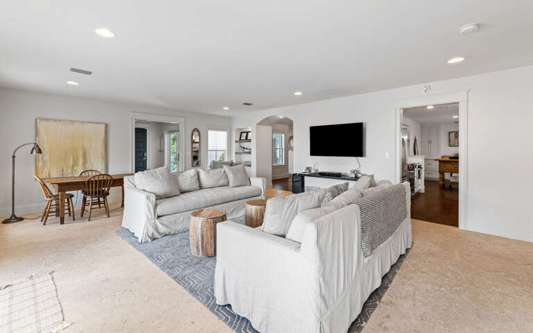 Sink into plush sofas in your bright, open living space where comfort meets styleâperfect for family movie nights.