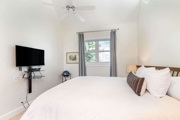 2nd Master guest suite with King bed. includes large ensuite bathroom, desk and flat screen TV