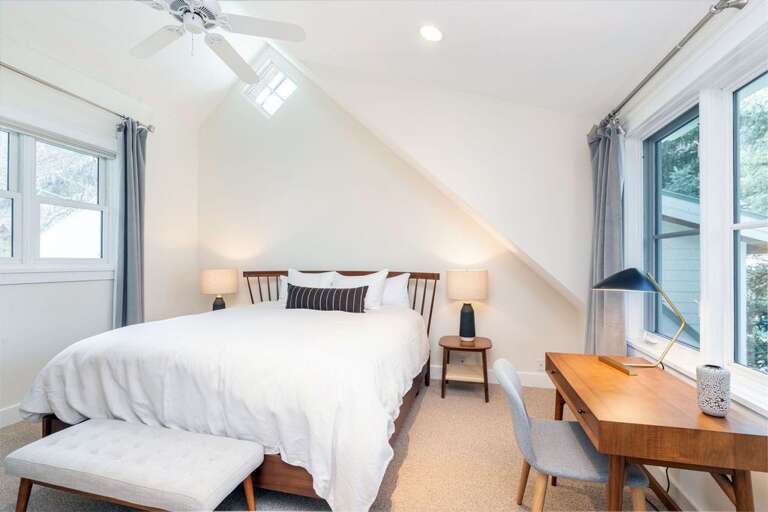 2nd Master suite with King bed, desk and flat screen TV.