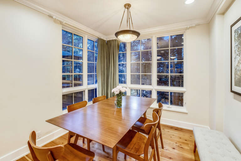 Seating for six in the dining room. Gorgeous new walnut table and walnut chairs and bench.