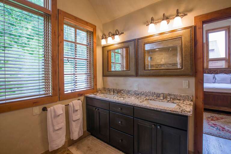 Master bathroom, double vanity and steam shower. Master bathroom, double vanity and steam shower.