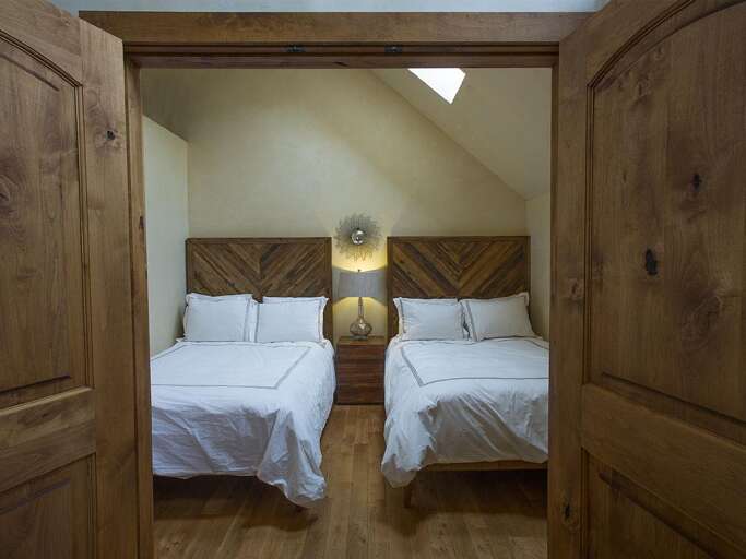 Guest room #4 with beautiful new full size beds by West Elm and crisp new linens. Guest room #4 with beautiful new full size beds by West Elm and crisp new linens.