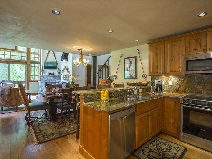 kitchen, dining and living areas