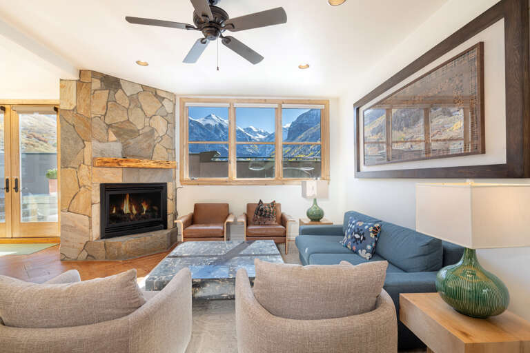 Living area with plenty of seating and Box Canyon views. Open with spacious living, dining and kitchen areas. Living area with plenty of seating and Box Canyon views. Open with spacious living, dining and kitchen areas.