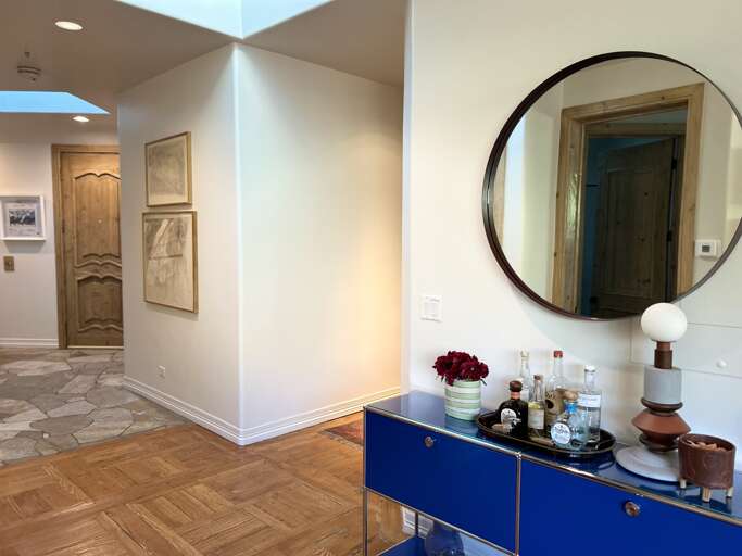 The Roofop entry-foyer with numerous skylights bathe this rooftop penthouse with natural light. The Roofop entry-foyer with numerous skylights bathe this rooftop penthouse with natural light.