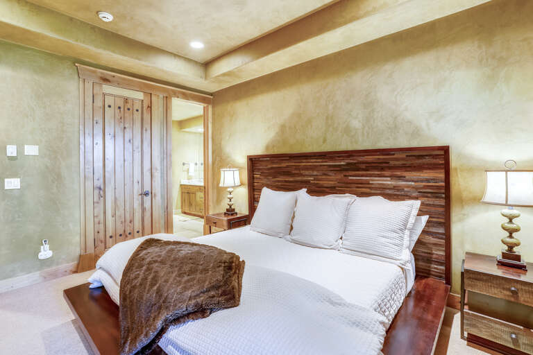 Second master suite with King bed and walk-out patio and hot tub.