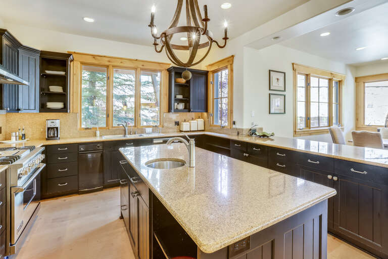 Large well appointed modern kitchen with the highest end appliances: Sub Zero, Viking and Wolf.