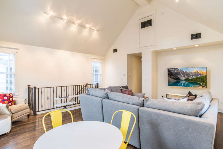 Spacious entertainment area with Sonos sound system and brand new flat screen TV. Lots of natural light.