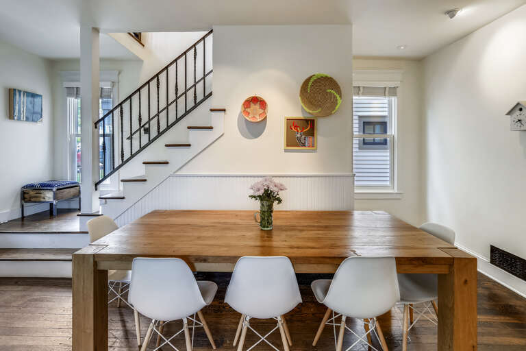 Beautiful dining table seats 8. There's a bench on the other side.