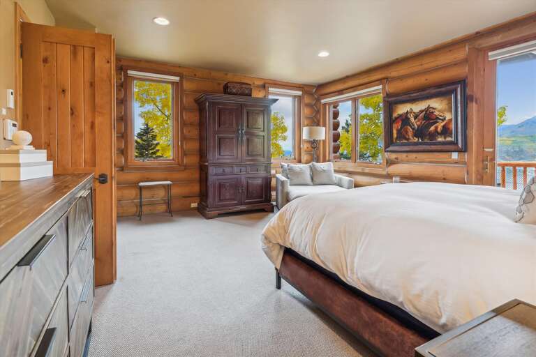 Ground Level - Master bedroom suite (reverse view) with King bed and private deck.
