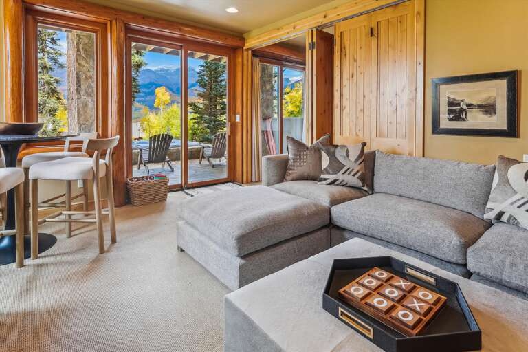 Lowest Level living area with firetable patio, hot tub and spectacular views!