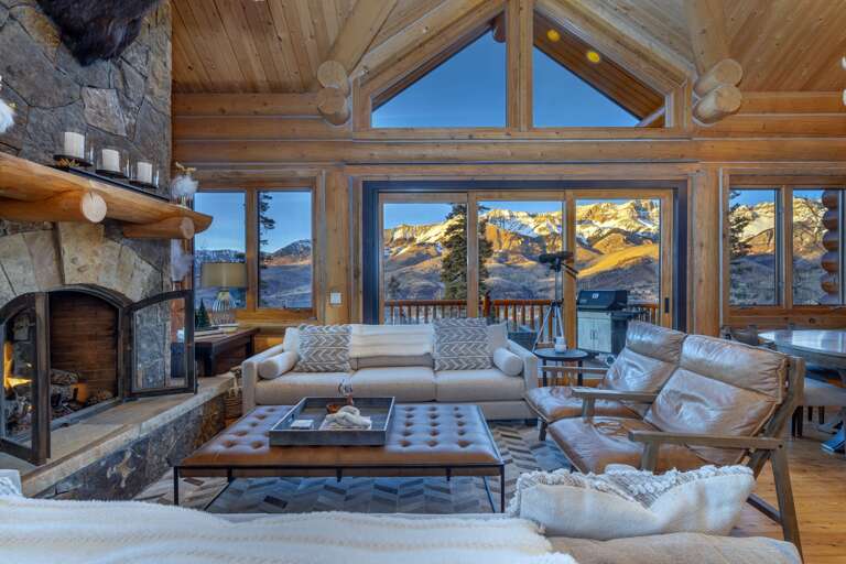 Alpine glow with dramatic San Sophia mountains and huge glass doors that open up to the outside!