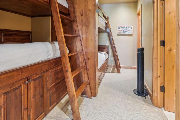 Lowest Level - 6th bedroom -bunk room with 4 twin bunk beds and a full bath.