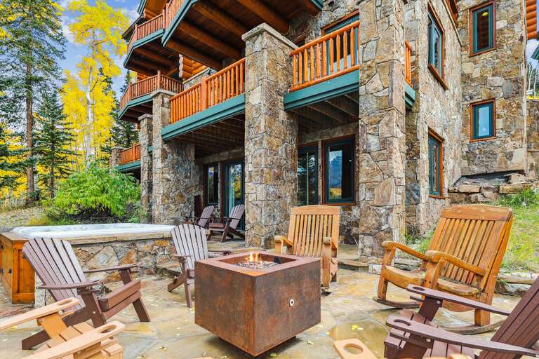Outdoor furniture and hot tub for relaxing at the end of your day.