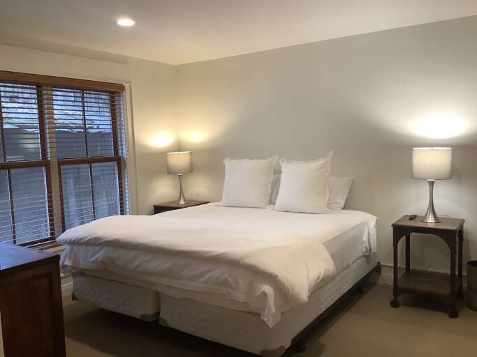The Master Suite with King bed and lots of natural light. The Master Suite with King bed and lots of natural light.