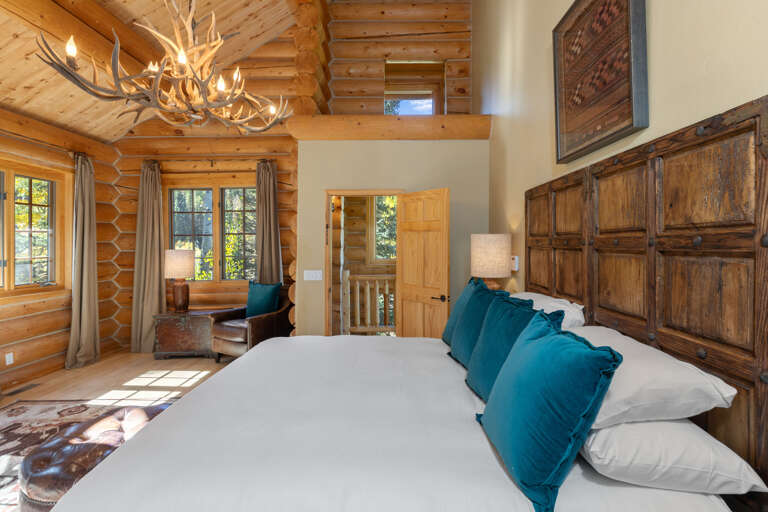 Large master bedroom King suite with siting area. A very large hot tub out the glass doors! Large master bedroom King suite with siting area. A very large hot tub out the glass doors!