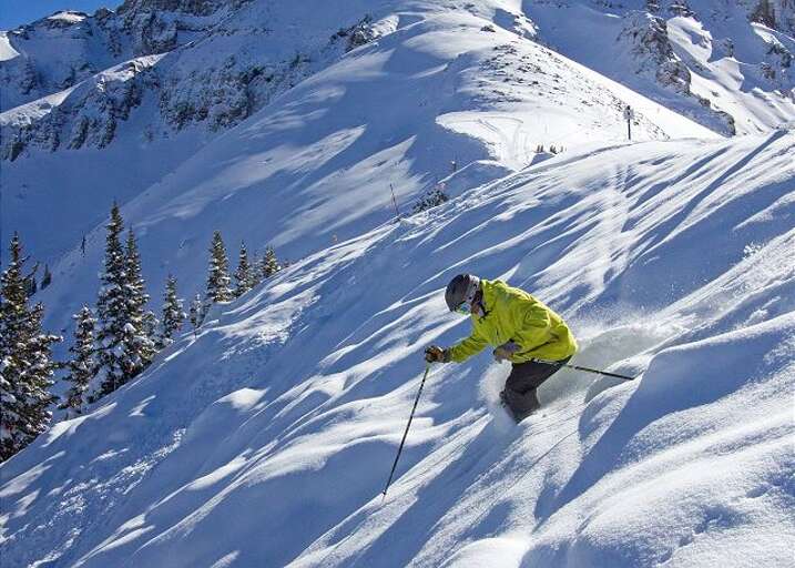Skiing the face of Telluride Ski Resort down to Gondola and Chair Lift 8.