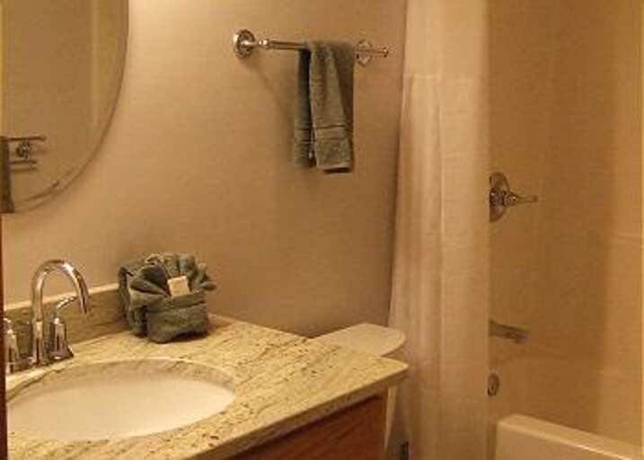 THERE ARE 3 AND 1.2 BATHROOMS LOCATED IN THE CABIN WITH ONE ON EACH FLOOR.