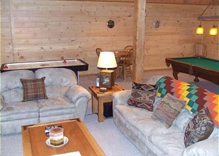 Plenty of seating provided for your movie time at the cabin