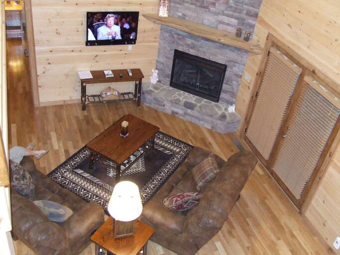 VIEW OF THE LIVING ROOM FROM THE LOFT