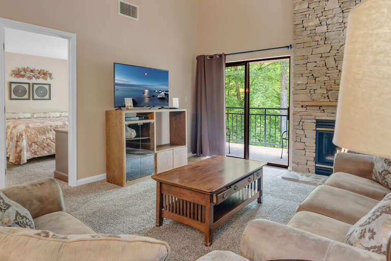 Living Room Interior Of A Vacation Rental With Sliding Door To Balcony Living Room Interior Of A Vacation Rental With Sliding Door To Balcony