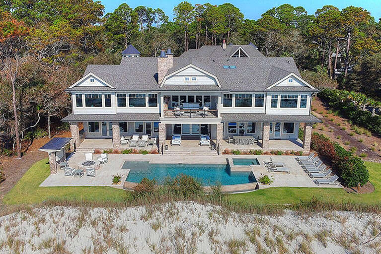 Large Lakeside Residence By Lush Landscape