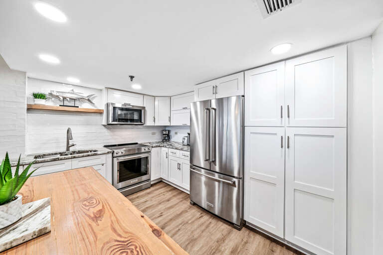 Ample storage space is available in the large kitchen cabinets, providing plenty of room for cooking essentials and to store your pantry items