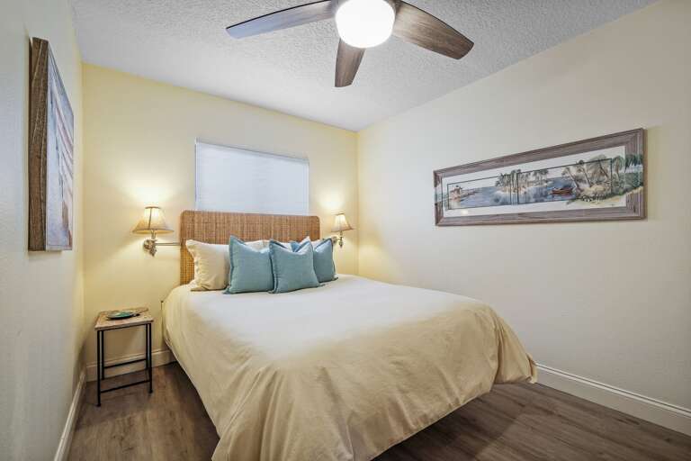 The guest bedroom is furnished with a comfortable queen bed, providing a cozy retreat for your guests