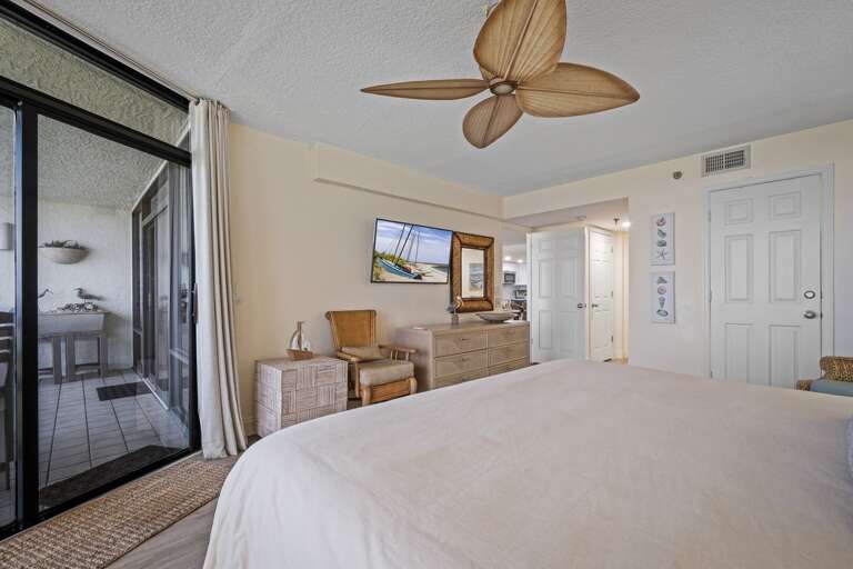 Relax in comfort with a plush king bed in the master bedroom, offering the perfect retreat after a day by the beach