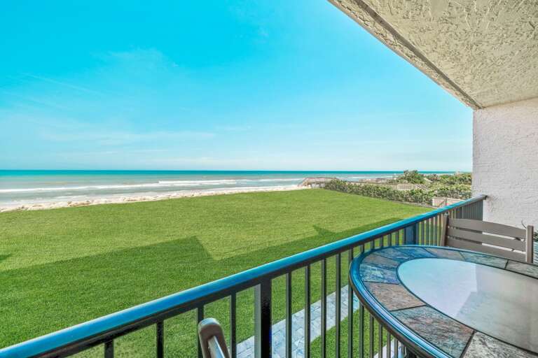 Relax on the private 2nd-floor balcony and soak in uninterrupted views of the no-drive section of New Smyrna Beach