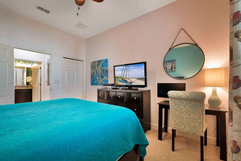 Each bedroom is equipped with its own TV, including the spacious king guest bedroom Each bedroom is equipped with its own TV, including the spacious king guest bedroom