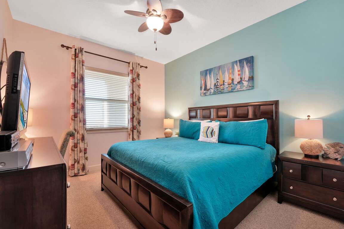 Comfortable guest bedroom featuring a king bed for a restful stay Comfortable guest bedroom featuring a king bed for a restful stay