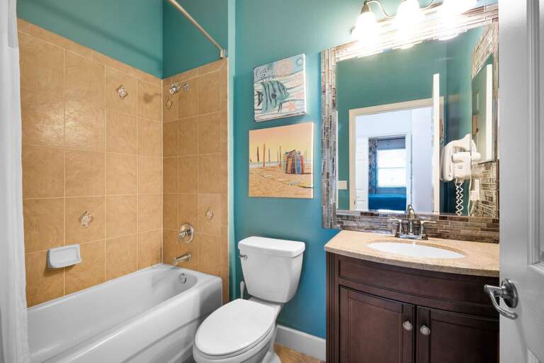 Guest bathroom featuring a tub/shower combo Guest bathroom featuring a tub/shower combo