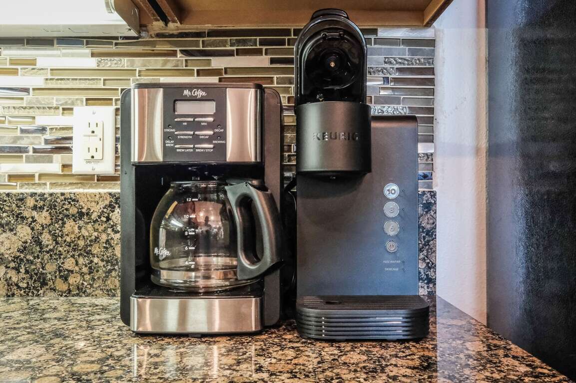 The kitchen is equipped with both a standard drip coffee maker and a Keurig The kitchen is equipped with both a standard drip coffee maker and a Keurig