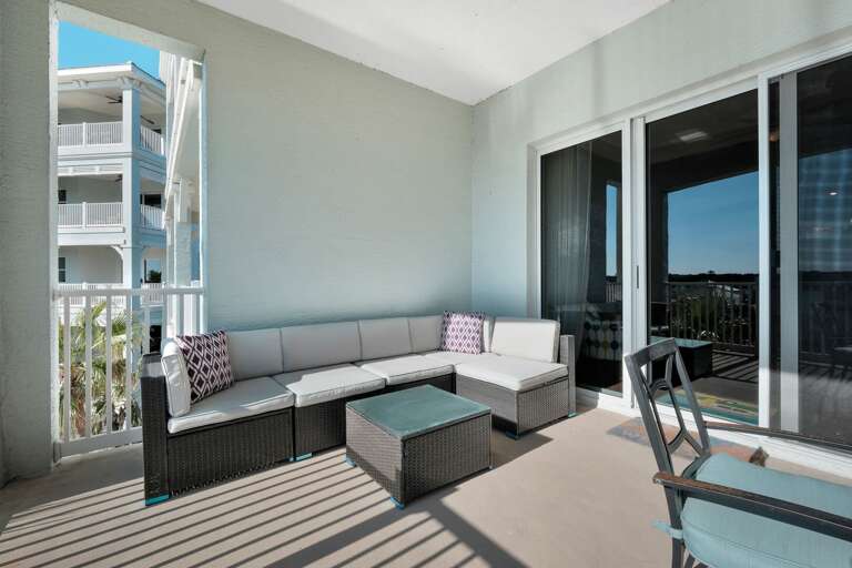 Relax on the outdoor balcony couch after a day at the beach Relax on the outdoor balcony couch after a day at the beach