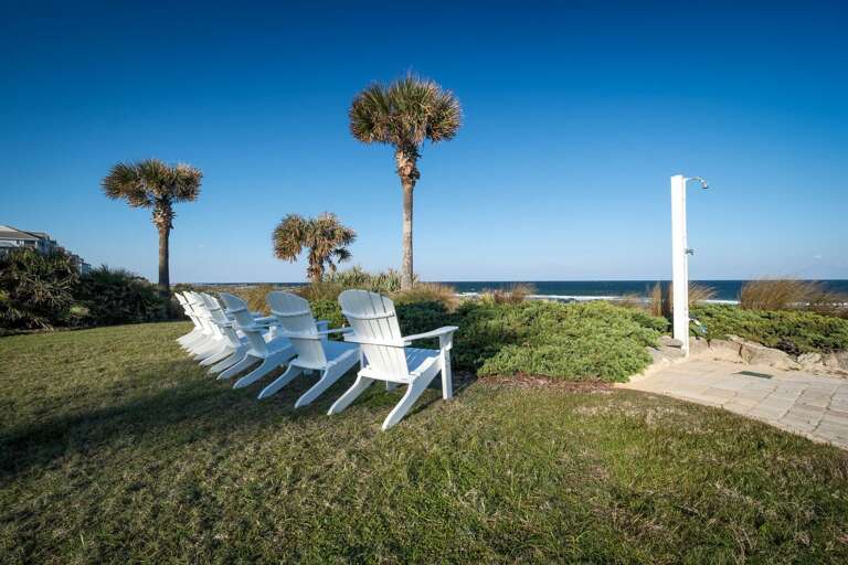 Sand rinse area and oceanfront seating located near the beach access Sand rinse area and oceanfront seating located near the beach access