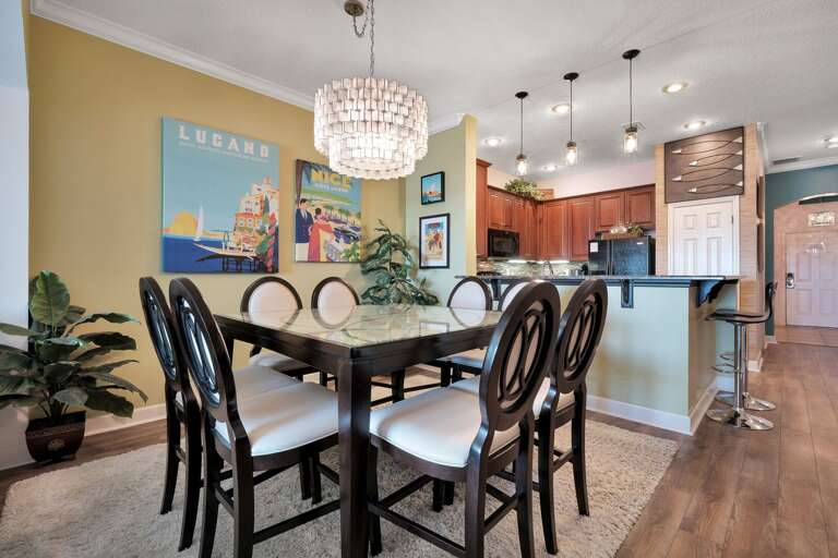 Seat up to 8 guests at the beautifully designed dining room, showcasing unique artwork Seat up to 8 guests at the beautifully designed dining room, showcasing unique artwork