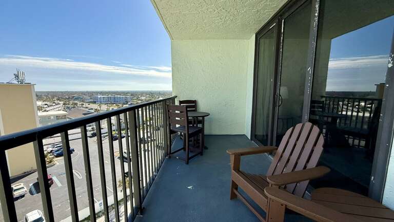Chairs and tables on the balcony, a great spot to enjoy the ocean breeze and views Chairs and tables on the balcony, a great spot to enjoy the ocean breeze and views