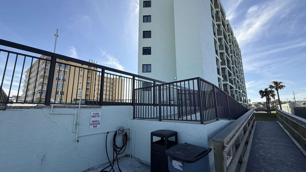 Convenient sand rinse station located right by Ocean Trillium Suites' beach access for a quick clean-up Convenient sand rinse station located right by Ocean Trillium Suites' beach access for a quick clean-up